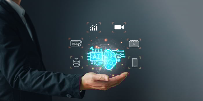 Man hold icon AI management, Marketers education, research, analysis media streaming content creation and online marketing strategy to grow their digital business. Using AI to analyze business. photo