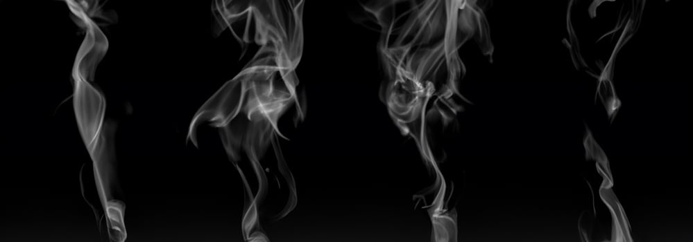 Abstract Swirling White Smoke on Black Background photo