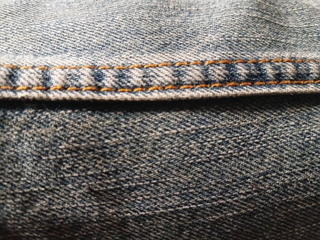 Rough fabric background texture. Suitable for clothing advertising additional design projects. photo