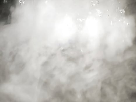 An Abstract Image of white steam with water droplets as background. photo