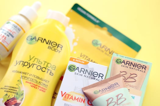 KYIV, UKRAINE - APRIL 20, 2024 Garnier production with company logo. Garnier is a mass market cosmetics brand of French cosmetics company L'Oreal photo