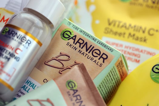 KYIV, UKRAINE - APRIL 20, 2024 Garnier production with company logo. Garnier is a mass market cosmetics brand of French cosmetics company L'Oreal photo