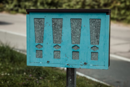an old locked chewing gum vending machine photo