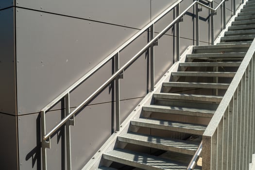 staircase at the building in the sun photo