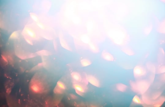 Abstract background with specks of light photo