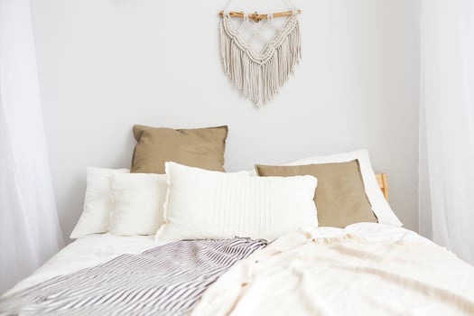 White and beige bedroom in boho style photo