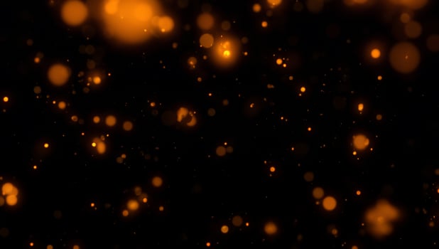 Red and Orange Glittering Light Effect in Night Sky photo