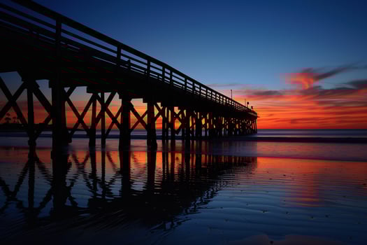 Pier with Sunset in Background photo