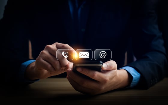 Man Using Smartphone to Access Communication Icons for Call, Email, and Internet, Representing Modern Digital Connectivity and Technology in Everyday Life photo
