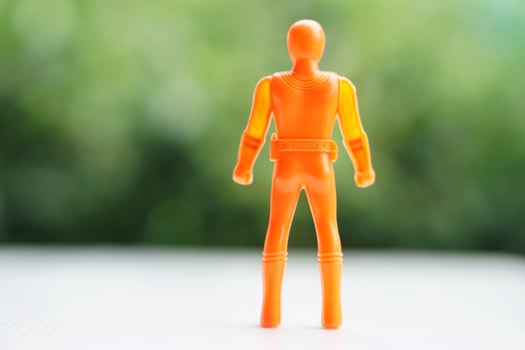Model of human plastic toy. Concept, Toy for kids, enhance imagination in childhood with toy characters of superhero. Fantasy comic fiction from cartoons, movie. photo