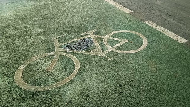 Road sign for bicycles on Jakarta city street photo