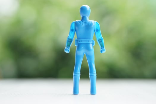 Model of human plastic toy. Concept, Toy for kids, enhance imagination in childhood with toy characters of superhero. Fantasy comic fiction from cartoons, movie. photo