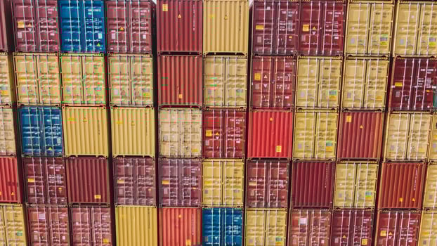 Shipping Containers In Warehouse Aerial. Aerial View Of Container Yard photo