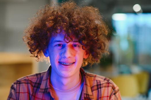 Headshot of happy redhead man, smiling excited at camera. photo