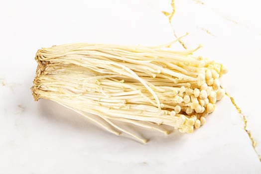 Tasty raw enoki mushroom heap photo