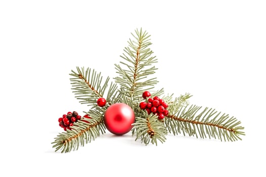Christmas Ornament on Pine Branch with Red Berries photo