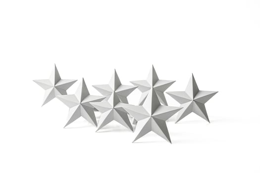 Five White Stars on a White Background photo