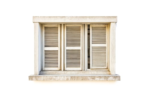 Old window with shutters on a white wall photo
