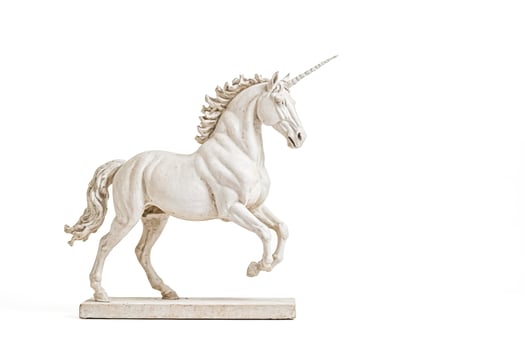 White Unicorn Statue on Pedestal photo