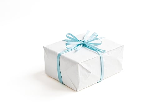 Gift Box with Blue Ribbon on White Background photo