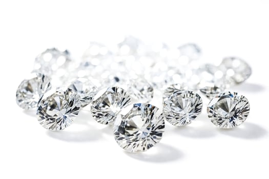 Sparkling Diamonds on a White Background photo