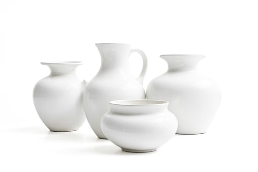 White ceramic vases on a white background photo