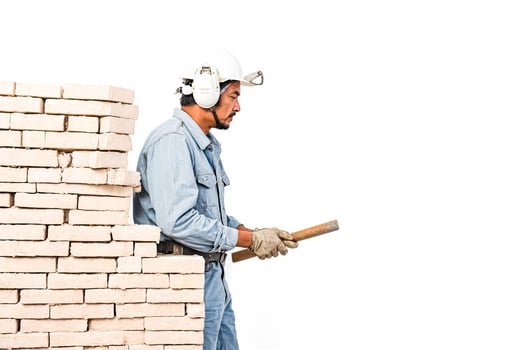Construction Worker with Brick Wall photo