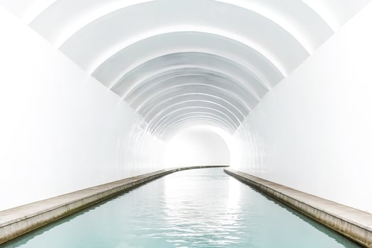 White tunnel with water channel photo
