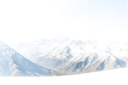 Snowy Mountain Range Against White Background photo