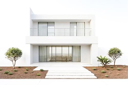 Modern white house with glass doors and balcony photo