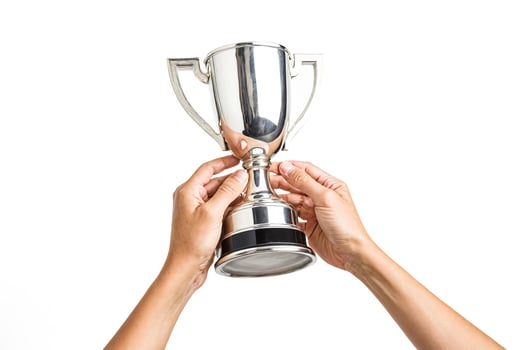 Close up of Hands Holding a Trophy photo