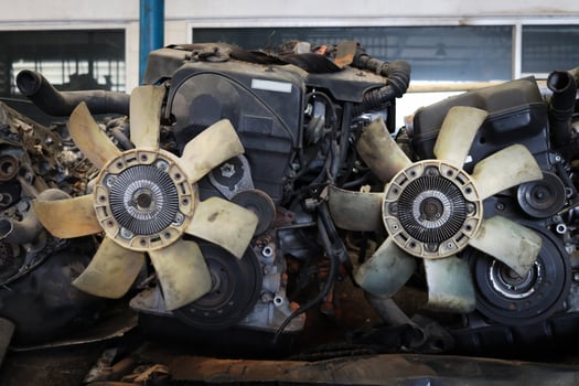 Auto parts and secondhand engine components in auto spare parts store. Spare parts of vehicle in warehouse. photo