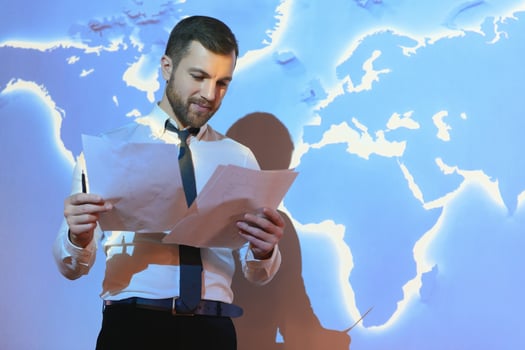 International business concept with businessman on background with network on map. photo