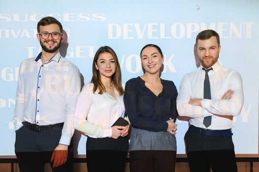 group of business people on the background of motivational words photo