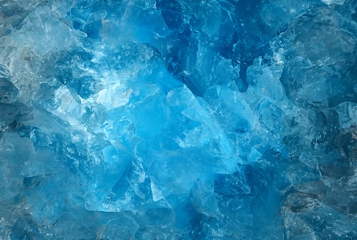 Close-Up of Crushed Blue Ice Glass Texture photo