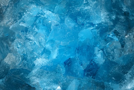 Close-Up of Crushed Blue Ice Glass Texture photo
