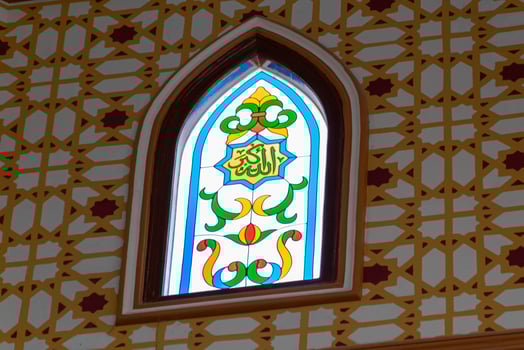 Arabic calligraphy decoration of the names of Allah and Muhammad in Islamic architectural decoration photo