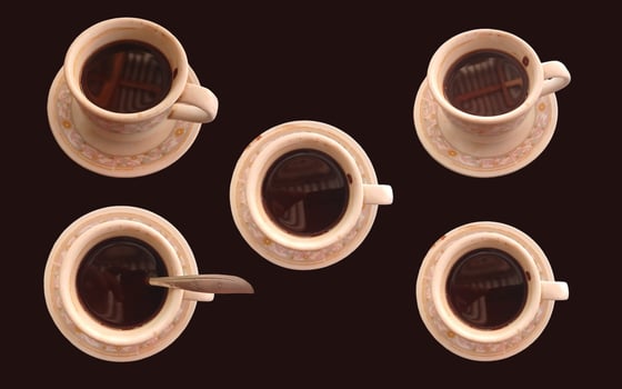 Cup of coffee isolated on brown background photo