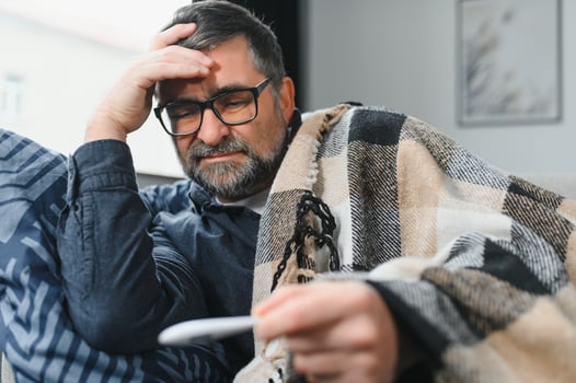 Old man suffering at home photo
