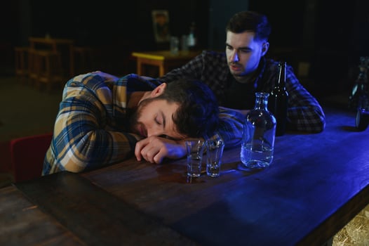 Young drunk man in bar photo