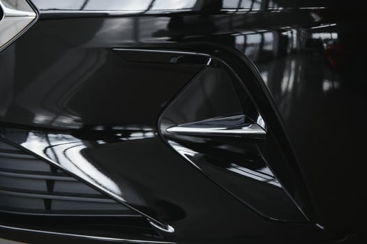 elements of the design of a modern car in a car showroom photo