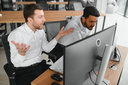 Two diverse crypto traders brokers stock exchange market investors discussing trading charts research reports growth using pc computer looking at screen analyzing invest strategy, financial risks. photo