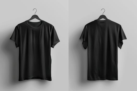 Two mockup black t-shirts hanging on hangers against a light gray wall photo