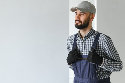 Positive male repairman at home photo
