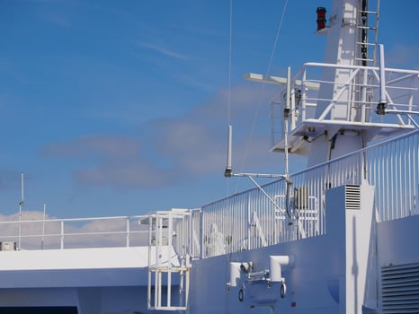 Radar antennas on board of a cruise ferry ship. Navigation system of the liner. Elements of radio location equipment in the ultrasonic wave range. photo