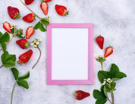 Strawberry with leaves and flowers photo