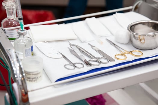 Surgical instruments for performing a small surgery procedure at the dermatologists office photo