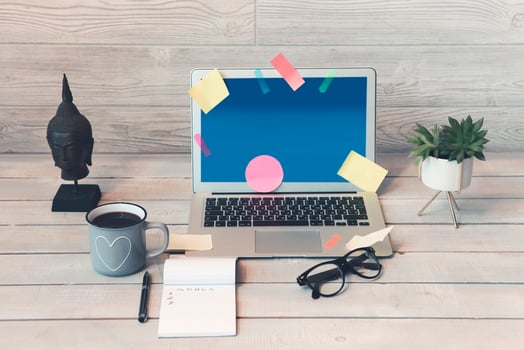 Wooden desk with supplies for freelance job photo