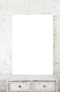 Blank poster against white brick background photo