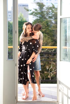 Young tattooed stylish couple in love photo